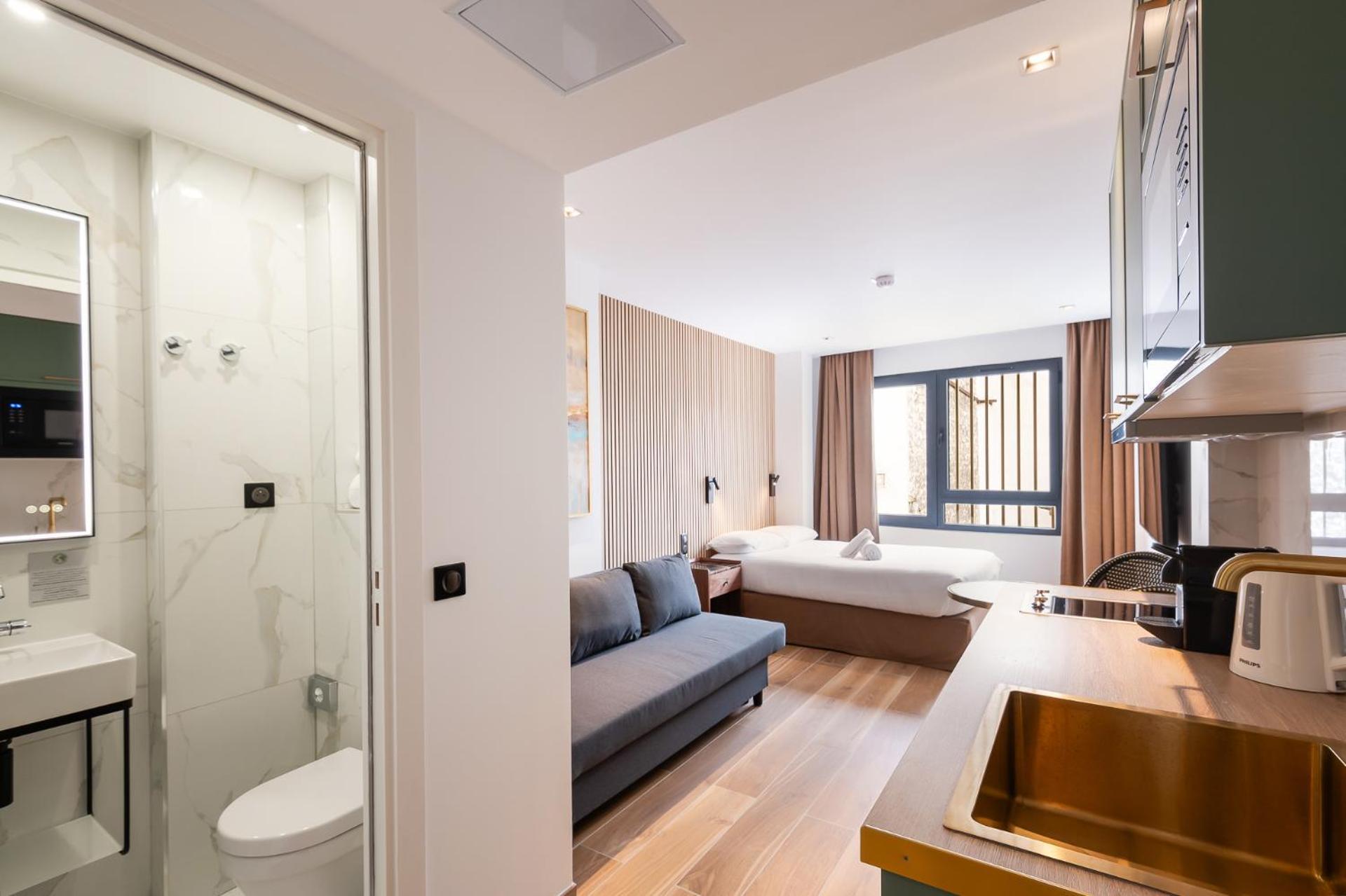 Les Suites Hcr Paris Exterior foto